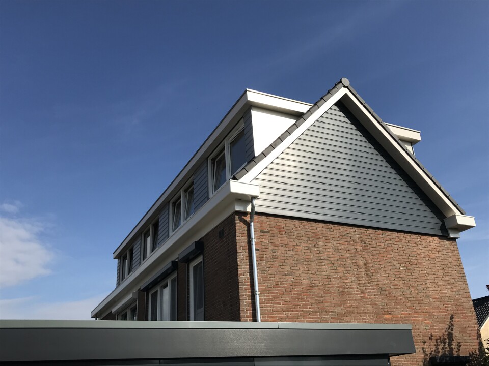 Nieuwe kap met dakkapellen Hoeven.